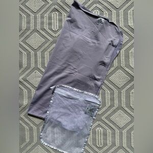 The Ollie Swaddle – Lavendar – Adjustable Baby Swaddle + Mesh Laundry Bag